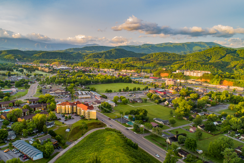 Aerial view of Sevierville with the Smoky Mountains in the background.